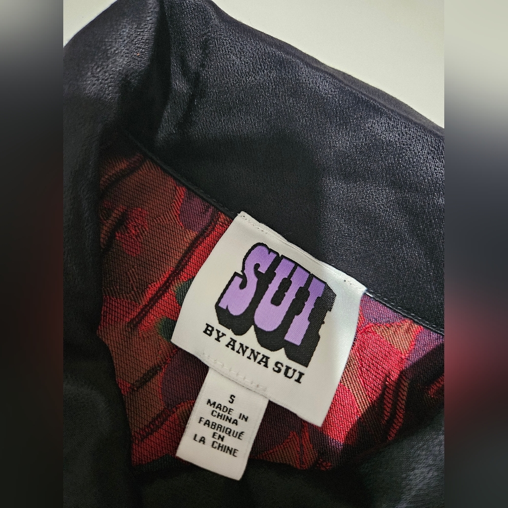 Campera Anna sui color azul rojo verde y negro